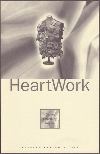 Cover of book entitled 'Heartwork' shows a handmade vest constructed from, covered with, wool gloves.