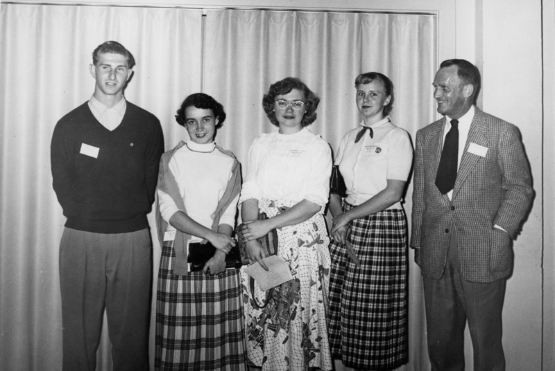 Calvin C. Flint stands with a group of students from Monterey Peninsula College for a photo in 1954. Flint was president of Monterey Peninsula College from 1947-1958.