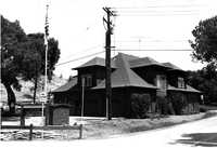 This carriage house, built by the Griffin family in 1901, was used as the Los Altos Hills Fire Department station for many years. Today is houses the district's archives. Photo taken in the 1970's.