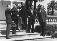 A group of visitors stands on the steps of Le Petit Trianon in 1965. This buidling is now the California History Center. 