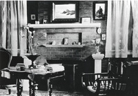 The living room of the Griffin House featured a large brick fireplace, which was the primary source of heat. Photo taken in 1908.
