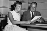 Sherill Ann Houseman, who plans to enroll at Foothill College, talks with Dr. Calvin C. Flint about her plans as a psychology major. Photo taken in 1958 at Foothill College's temporary location in Mountain View.