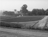 The Foothill College football field is under construction in 1959. 