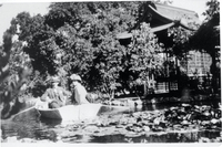 The Griffin fish pond and tea house were a favorite spot for family relaxation. The man and woman in the boat are not identified but are believed to be Willard C. Griffin, grandson of Willard M., and his wife. Photo likely taken in the late 1930s or early 1940s. 
