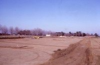 A view of the cleared ground just prior to the beginning of major construction.  In the distant right of the photo, the Baldwin Winery building can be seen and, near the distant center is Le Petit Trianon, being prepared for a move to new location. This photo was taken from the approximate location where the S1 building will be built. 