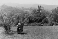 Calvin Flint sits in a classroom desk on the site of the future Foothill College. This photo was taken in 1958, just after the purchase of 122 acres of land in Los Altos Hills was completed. 