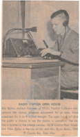 Photograph of Bob Ballou at the KFJC broadcast desk preparing for an open house this evening at the station at Foothill College in mountain View. 
