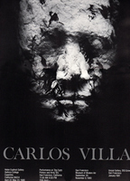 Poster with close-up of rough-textured Carlos Villa plaster face mask with feathers.