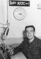 Unidentified student at the broadcast desk of KFJC in the basement of Foothill College in Mountain View. 
