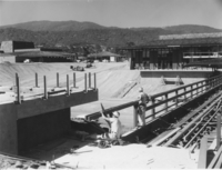 The Footbridge, Campus Center, Campus Loop Road and Appreciation Hall under construction.  The Los Altos Hills campus opened to the public in the Fall of 1961.