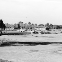 By 1966, the land had been cleared and construction of the college had begun. Near the center of the photo can be seen the winery building, which would later be home to the De Anza College Bookstore. It is now Financial Aid, Printing Services and adjunct faculty offices. 