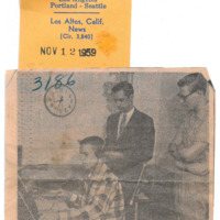 Photograph of Bob Ballou at the KFJC broadcast desk with program manager Roy Ruth and traffic manager Roger Murray standing behind him.