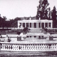 This image of Le Petite Trianon (The California History Center) was likely taken in the early 1900's. The older home of the Baldwins can be seen just over the roof of the newer Pavilion building. One of the adobe buildings that was used to house servants can be seen just to the left of the Pavilion, partially hidden by trees. The picture was taken from the location where the DeHart Learning Center now stands.
