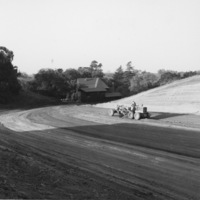 The Campus Loop road is graded by a  contractor.
