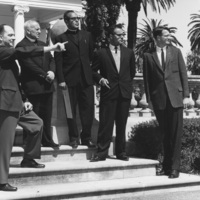 A group of visitors stands on the steps of Le Petit Trianon in 1965. This buidling is now the California History Center. 