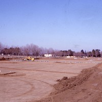 A view of the cleared ground just prior to the beginning of major construction.  In the distant right of the photo, the Baldwin Winery building can be seen and, near the distant center is Le Petit Trianon, being prepared for a move to new location. This photo was taken from the approximate location where the S1 building will be built. 