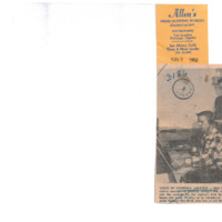 Photograph of Bob Ballou at the KFJC broadcast desk with program manager Roy Ruth standing behind him. 