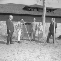 Members of the Board of Trustees stand in front of the Baldwin Winery building to survey the land prior to the construction of De Anza College. From left to right: A.P Christiansen, unknown surveyor, Hugh C. Jackson, Mary Lou Zoglin and Dr. Robert Smithwick.