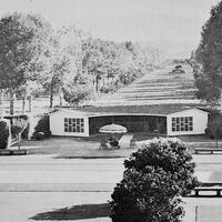 
This photo, taken from the steps of Le Petite Trianon in 1960, shows the changes in the pool and garden area. There is now a pool house and the pool itself has been redesigned. Just behind the pool house is the future location of the DeHart Learning Center.
