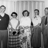 Calvin C. Flint stands with a group of students from Monterey Peninsula College for a photo in 1954. Flint was president of Monterey Peninsula College from 1947-1958.