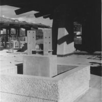 Concrete blocks and metal supports were used to support a roof over the entrance to the original Campus Center.